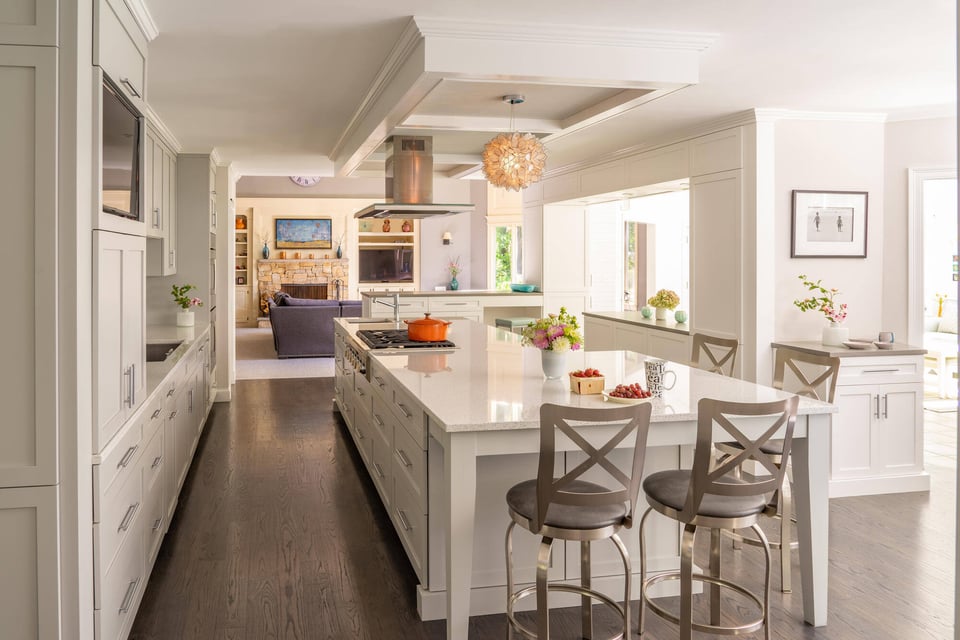 Luxury kitchen remodel by Thomas Buckborough in Boston, MA, with a large island, custom cabinetry, and a spacious open layout