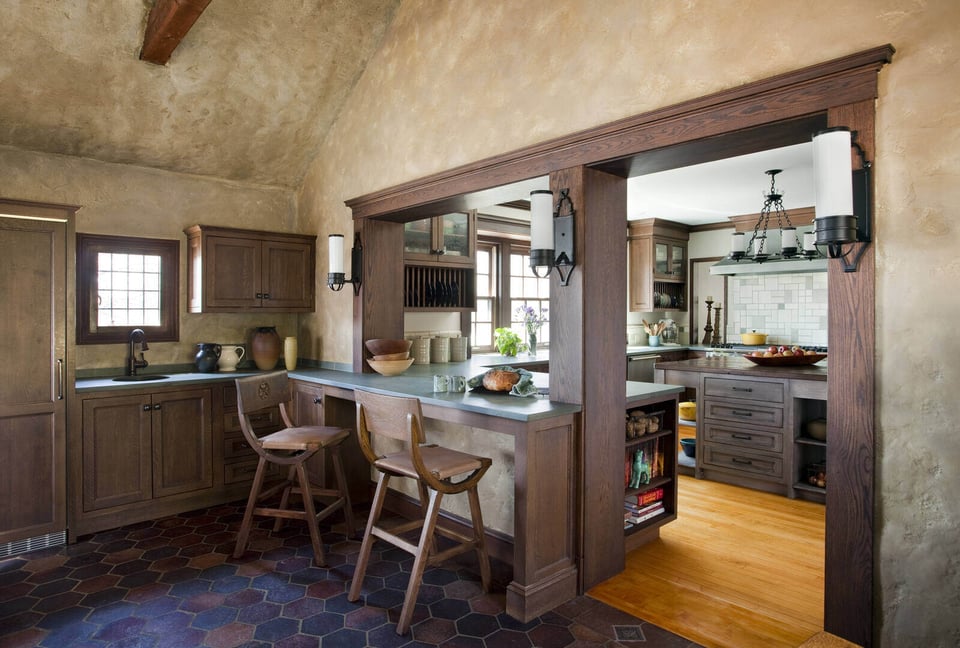 Bright and modern kitchen renovation with floor-to-ceiling windows, contemporary cabinetry, and a spacious island