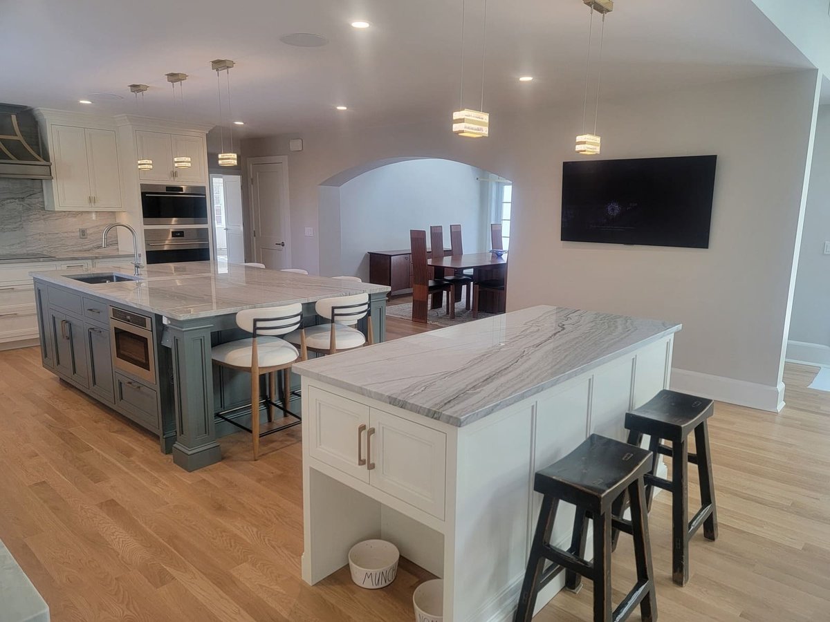 High-end kitchen renovation with custom cabinetry and luxurious materials, bringing timeless elegance to an Acton, MA, home