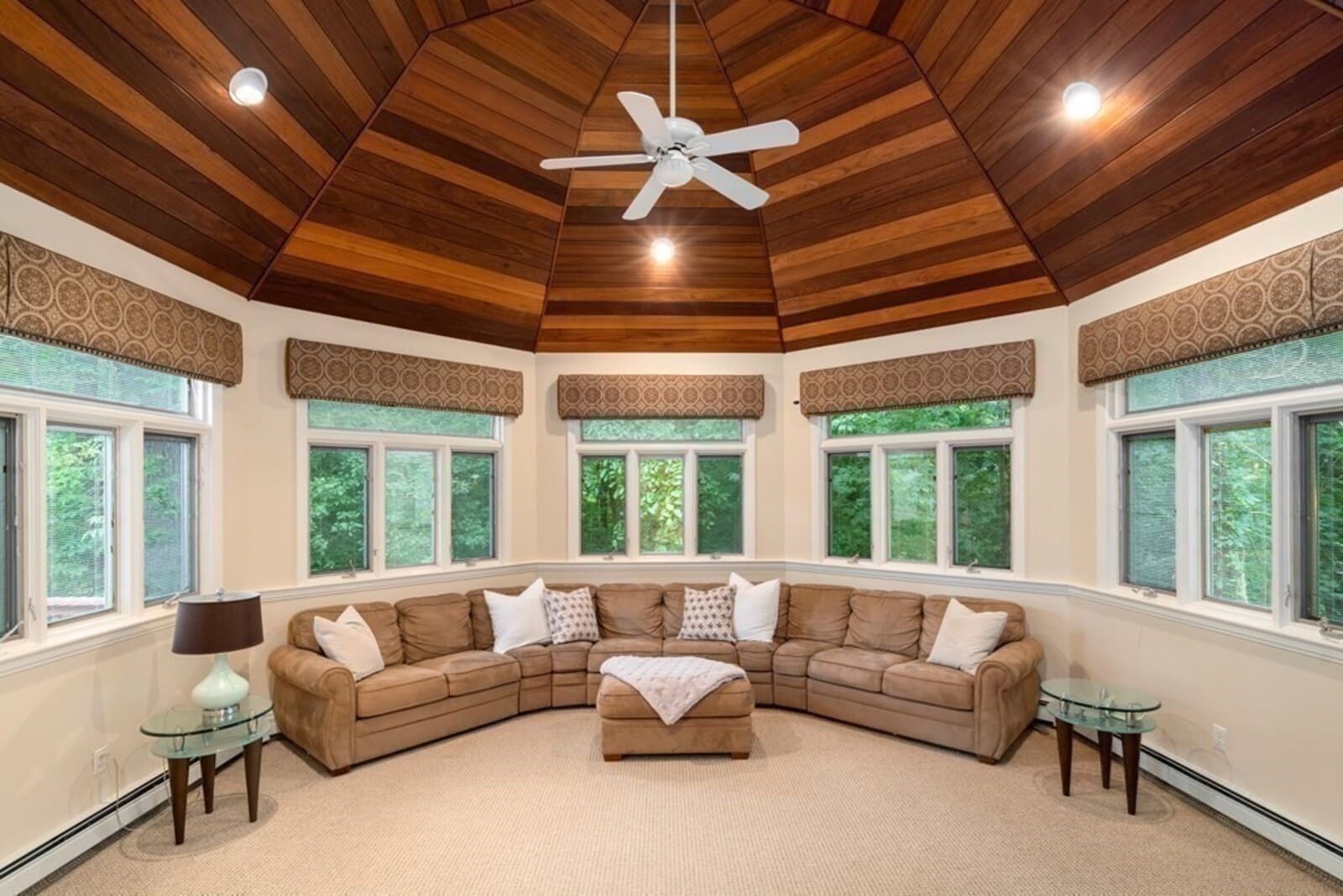 Cozy sunroom remodel with vaulted wood ceiling by Thomas Buckborough & Associates in Acton, MA