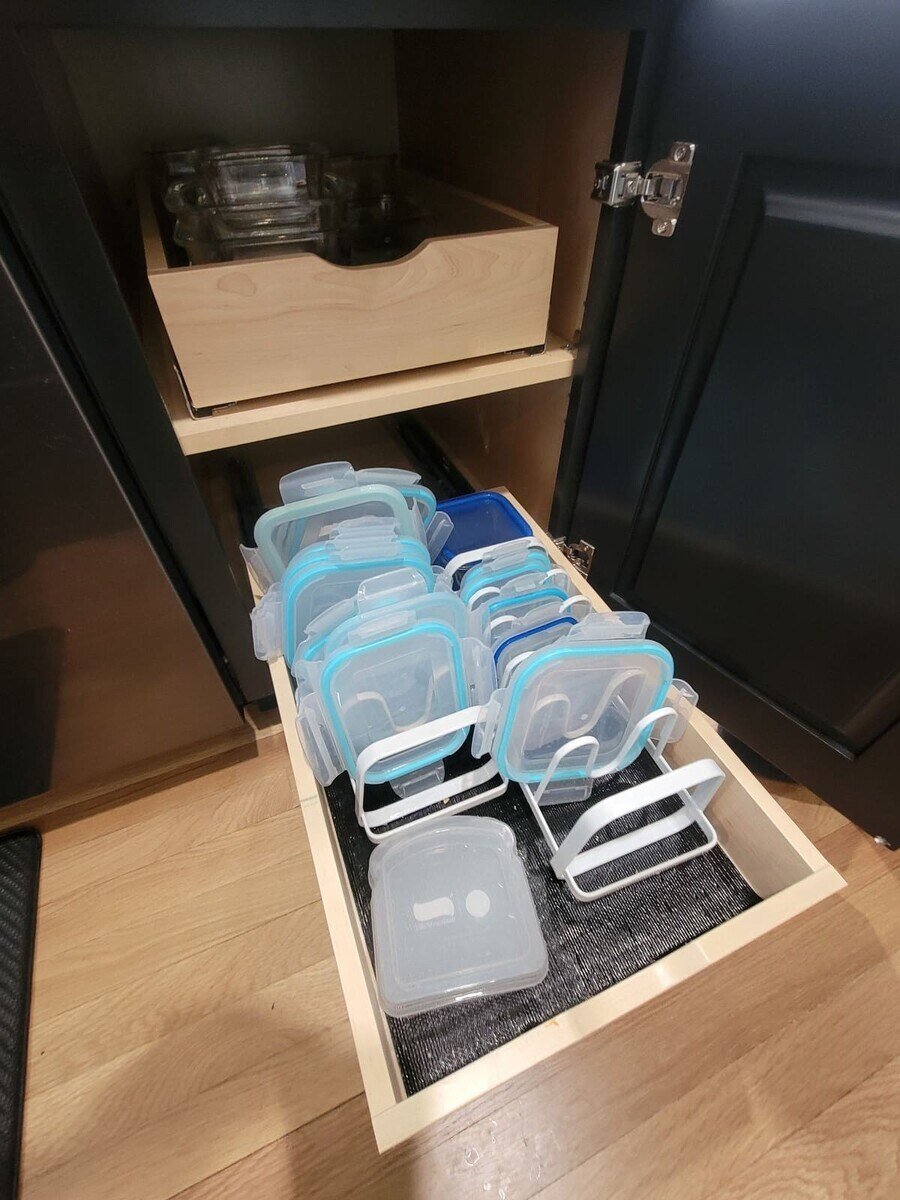 Thoughtful kitchen storage with a dedicated drawer for plastic container lids in a high-end Acton, MA renovation