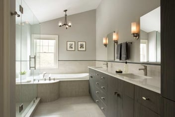 Elegant custom bathroom renovation in Acton MA by Thomas Buckborough & Associates with soaking tub and sleek fixtures