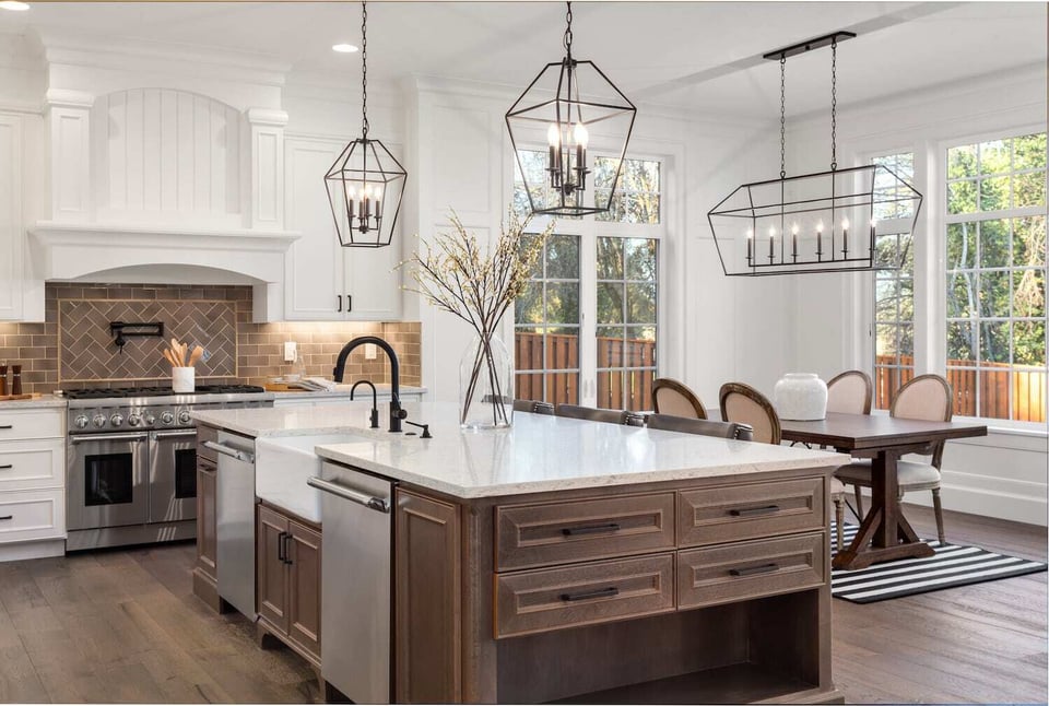 Concord MA Kitchen Renovation with large kitchen island and custom lighting