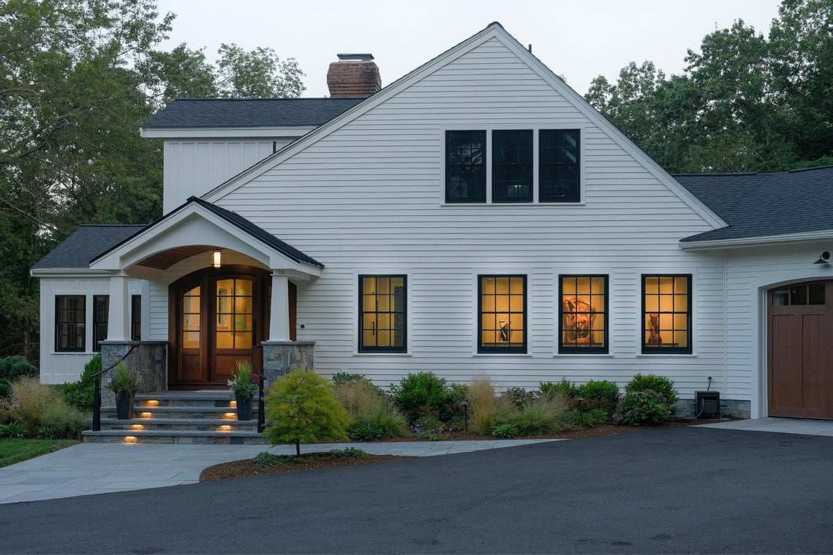 Large black and white modern farmhouse renovation in acton, massachusetts
