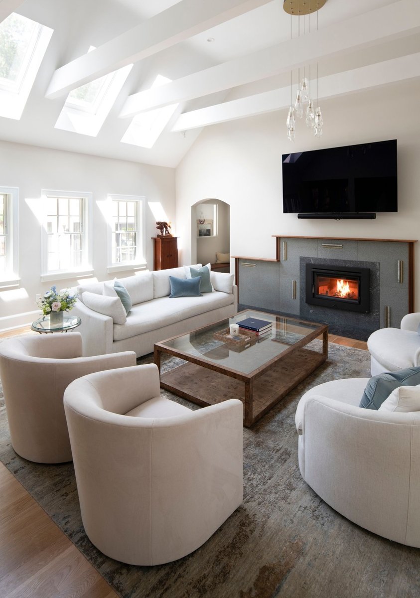 whole home renovation in acton with vaulted ceilings and fireplace seating area